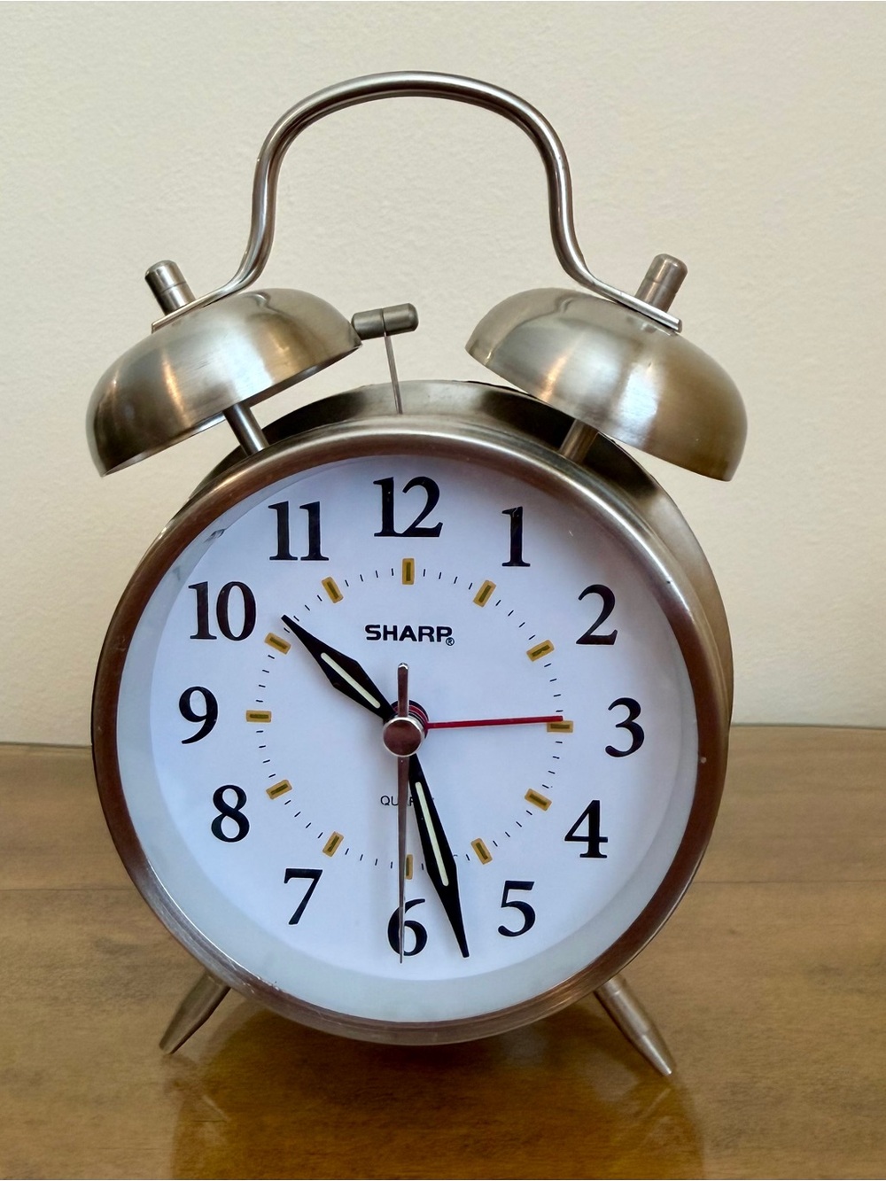 Sharp Twin Bell Alarm Clock in a silver brushed metal finish